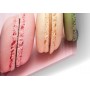 Fond de hotte rose pastel avec macarons multicolores : chocolat, framboise, vanille et pistache